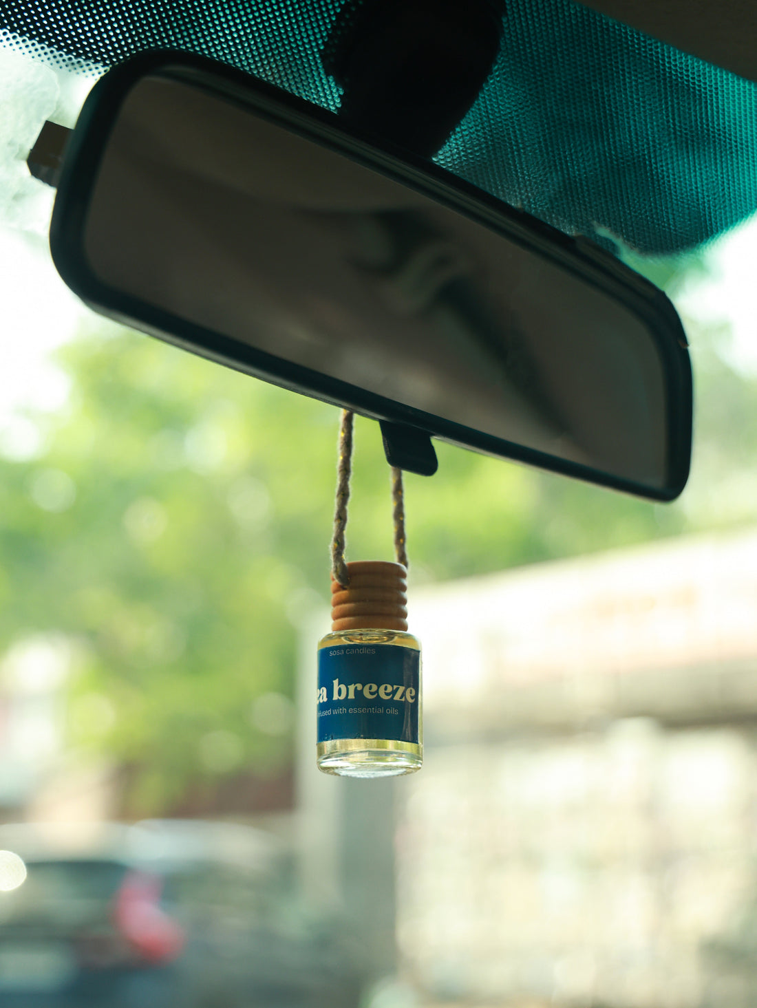 I Love My New-Car Smell. What Fragrance Can I Add Without Completely Covering It?